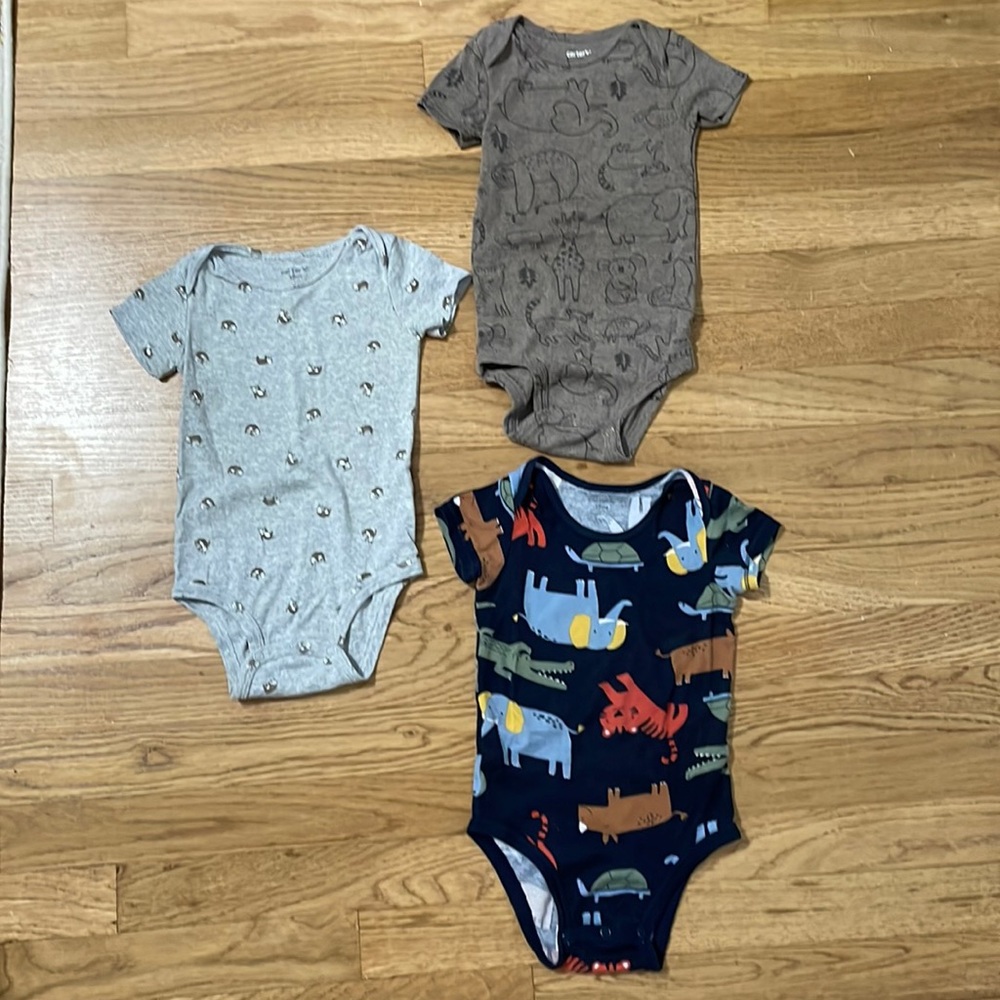 Three animal print baby boy bodysuits